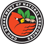 ODNR Logo of the Ohio Department of Natural Resources featuring a red cardinal with green leaves and brown acorns inside a black circle edged with the departments name in white letters.
