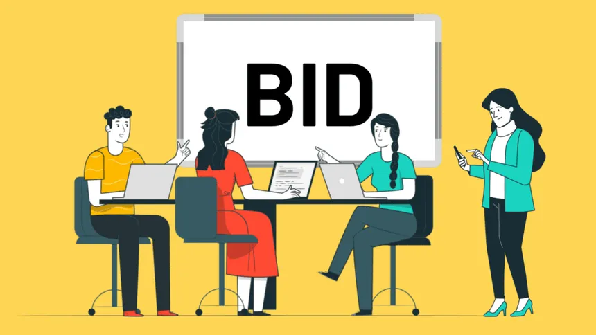 Four people sit at a table using laptops and tablets, while one person stands looking at a phone. Behind them, a large screen displays the word BID in bold letters. The background is yellow.